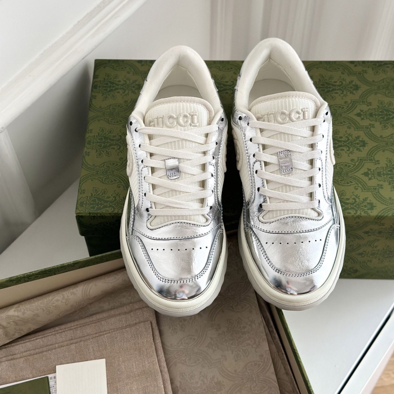 G*u*i sneakers